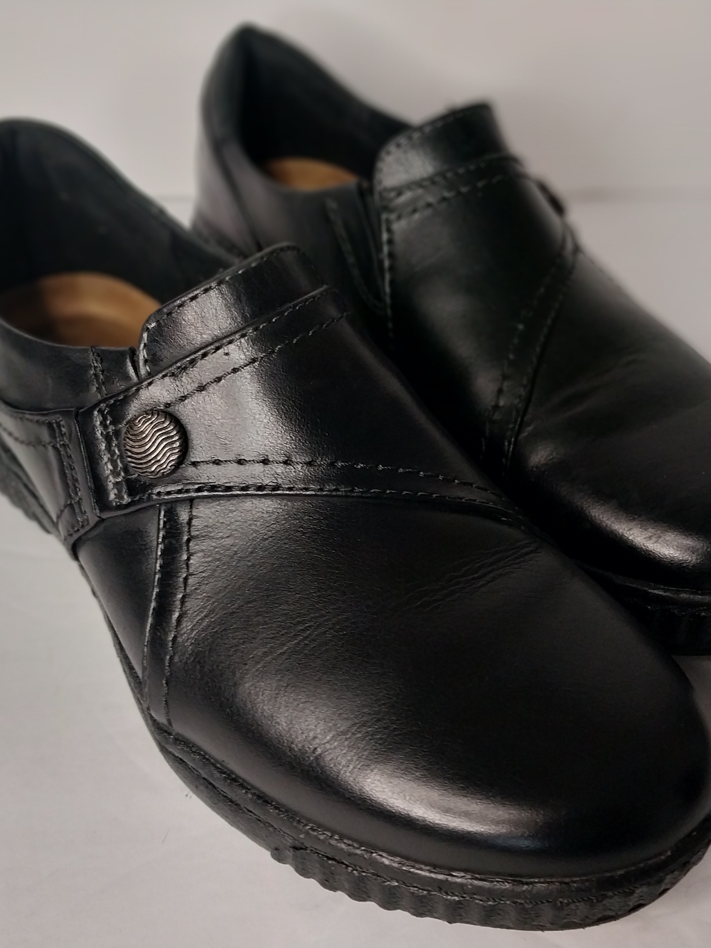 Clarks Black Leather Slip-On Loafers with Button Accent